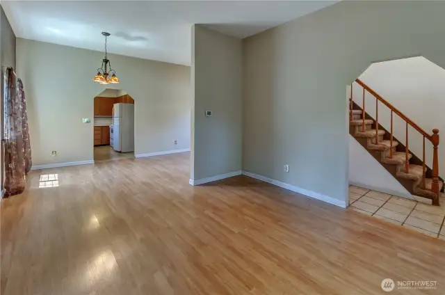 Bright and open main level with seamless flow from living to dining to kitchen—ideal for comfortable living and entertaining.