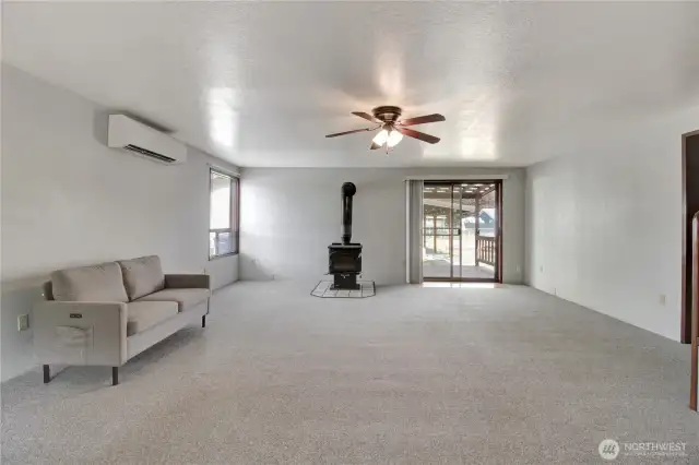 Living area as you enter the front door. Hall to kitchen and bedrooms on the right.