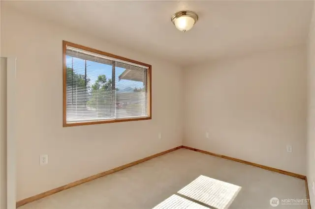 down the hall, this is the first bedroom!