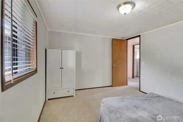identical second bedroom from far corner. both on the first floor