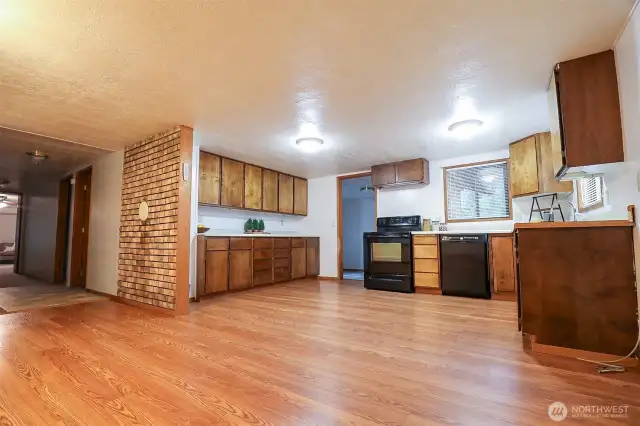 Kitchen, extra mudroom or utility room, and dining room all on the south side of the home.
