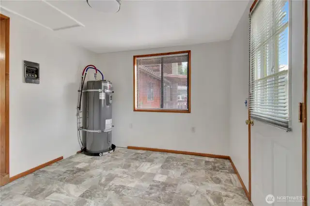 Utility room through the kitchen! kitchen pictures are coming soon!