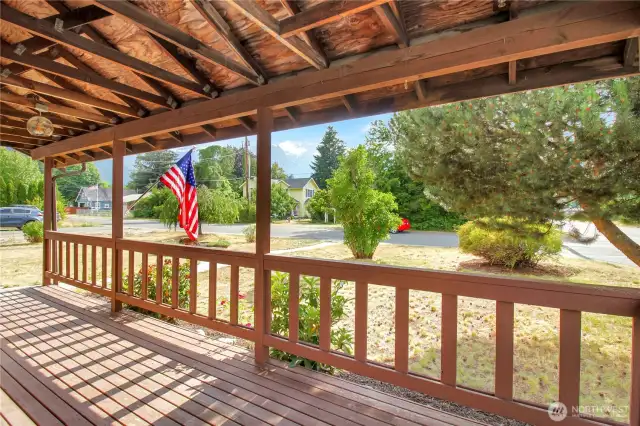 Front deck space with views of the front yard and partial mountain views.