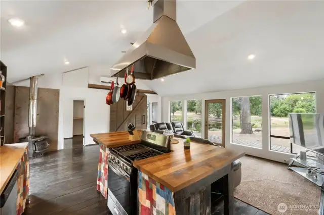 Cook, relax, and entertain—all while soaking in peaceful pond views from this light-filled, open-concept cabin.