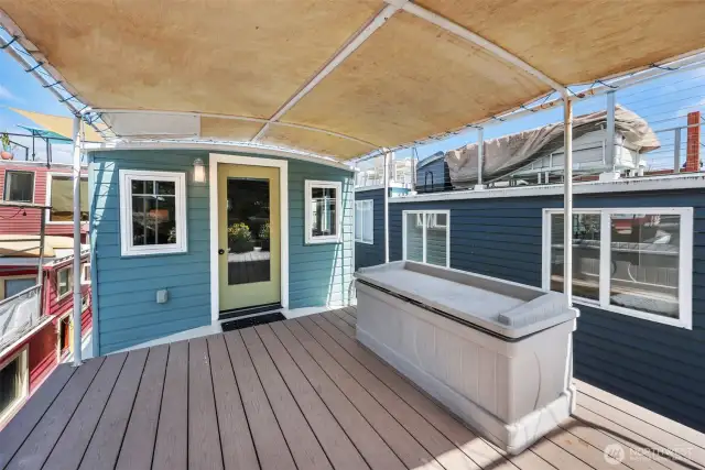 Wow! Expansive deck, keep it covered or remove the sail for full sun exposure.