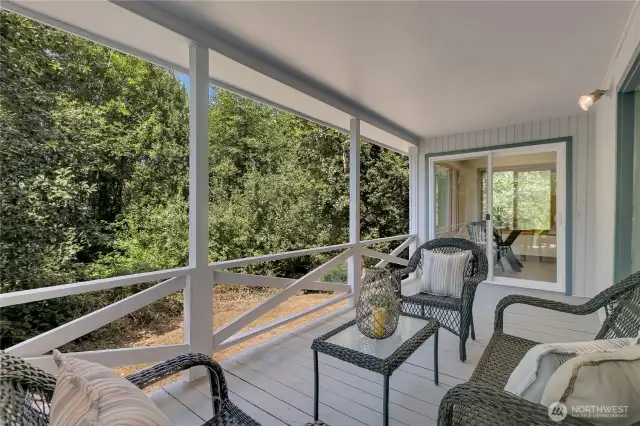 Year 'round pleasure on this oversized covered deck.  Steps to backyard and forest trails.