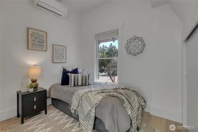 Second level side bedroom.  Mini-split for all year comfort.  Looks east. Also has sweet nook as enter.