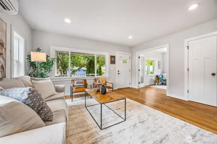 Adjoining, sunny office with French doors and closet space for additional of storage.