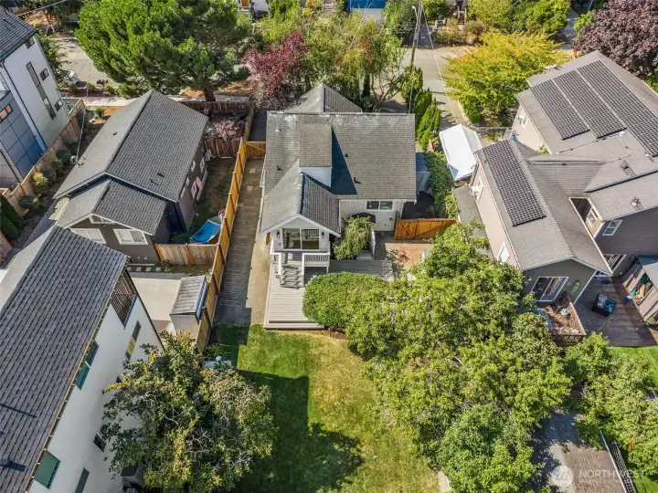 Large 6,650 square foot lot fully fenced with two driveways for tons of off-street parking.