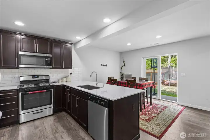 kitchen adjacent to designated eating space