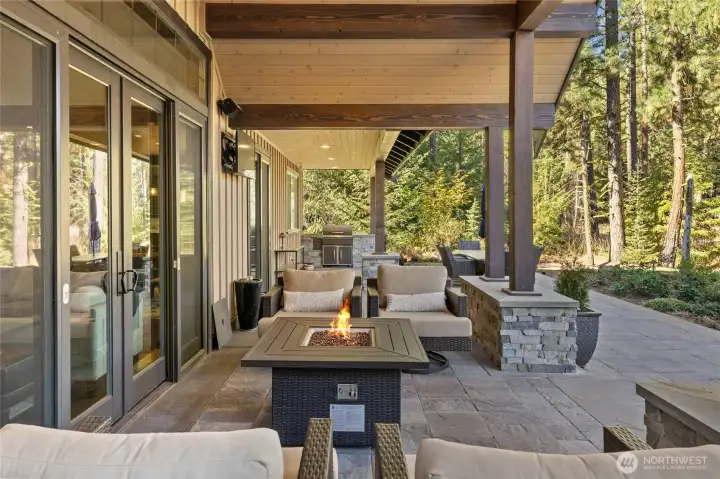 Covered outdoor space with TV, Speakers, and BBQ