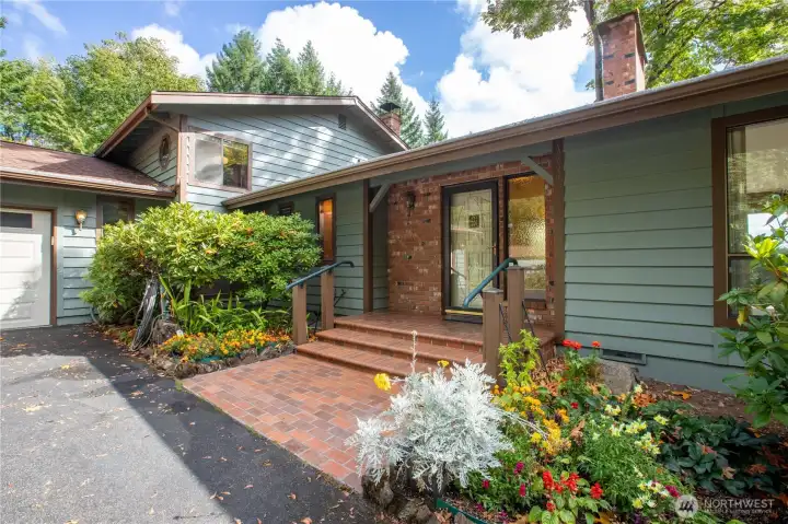 Beautiful front porch and bonus the flowers are still out!