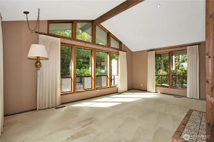 Living room with wood burning fireplace