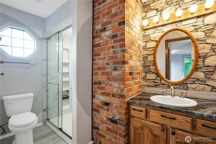 Primary bathroom with additional sink.