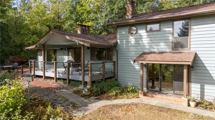 Back of home, slider just off of dining room and family room.