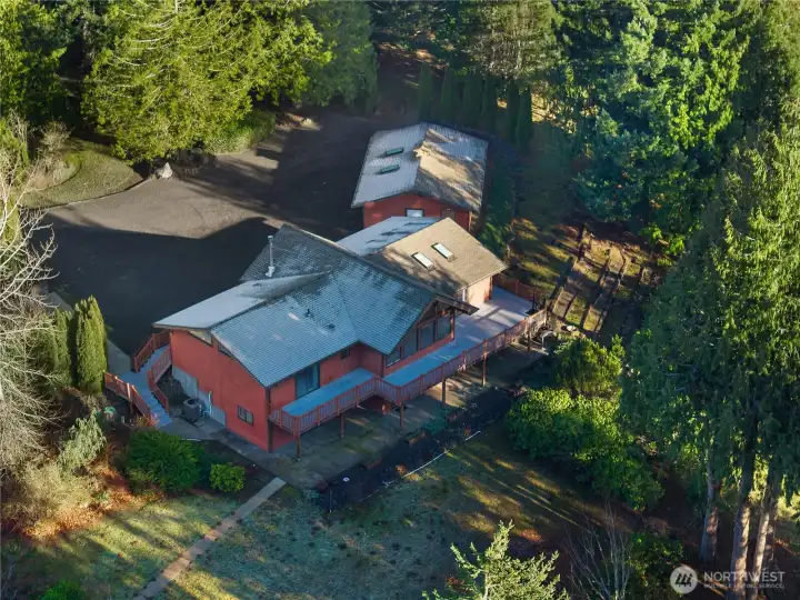 Aerial view of the home and 3-car garage