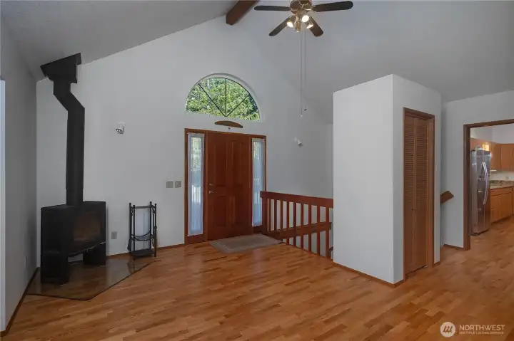 Entryway w/ wood fireplace.