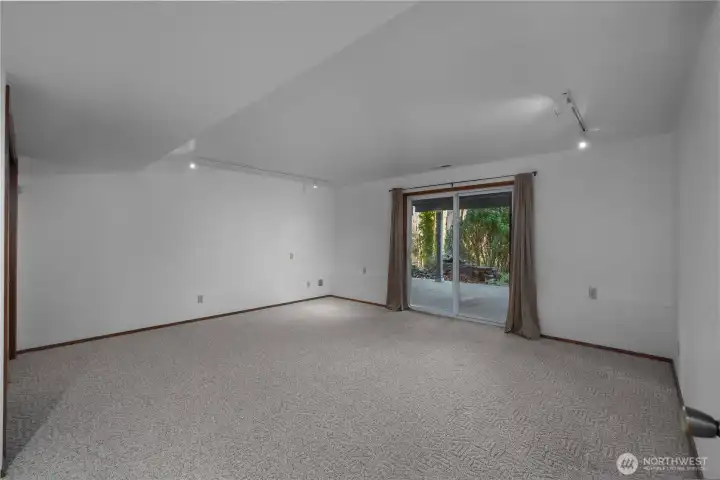 2nd primary bedroom w/ 3/4 bath on lower level. Sliding door leads to patio