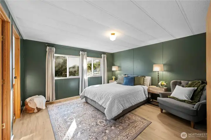 Luxurious, cozy main bedroom will have you sleeping well, in style.