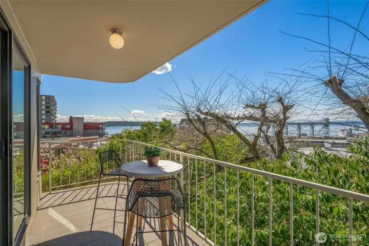 The home has 2 balconies, one off the main living space and one off the primary suite.