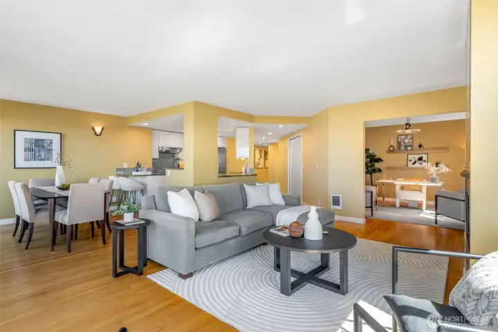 Great open floor plan with room for a large dining table and a semi-open kitchen.