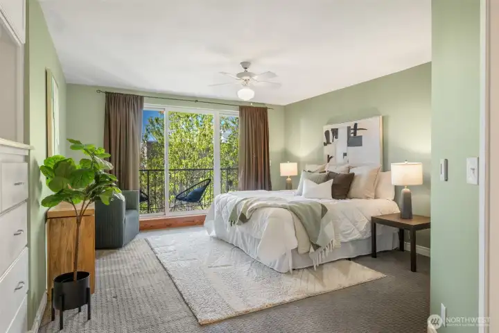 The primary suite is on the north side of the home, a gracious sized bedroom that would fit a king + side tables and seating.
