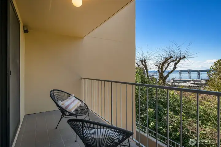 The sliders open up to another covered balcony.