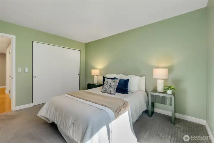 A double closet in this room. There is also a large coat closet, linen closet and storage closet.