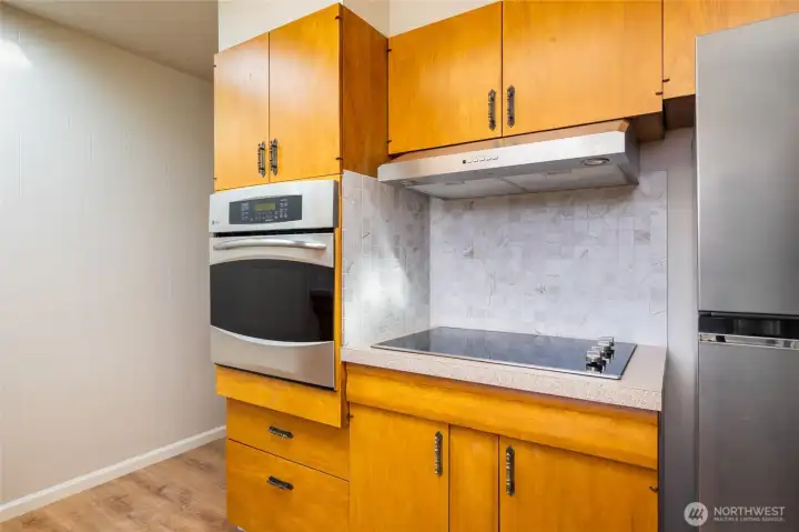 New cooktop, new refrigerator and newer  oven.