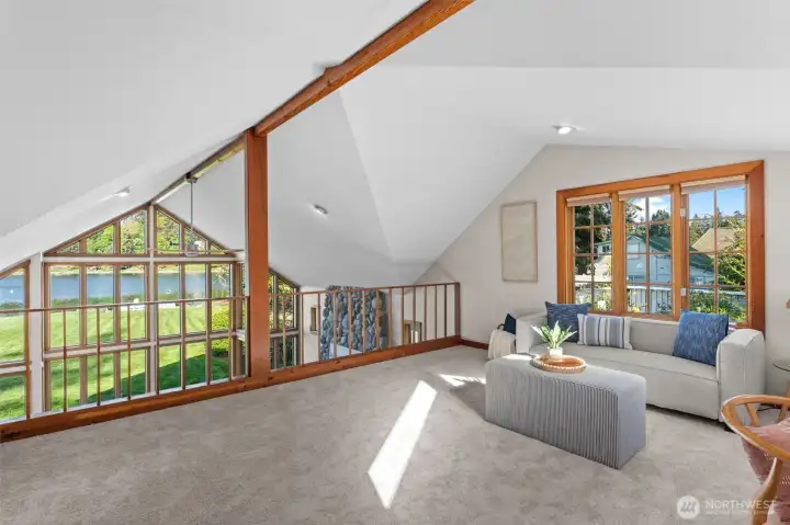 Loft overlooking living room with big view