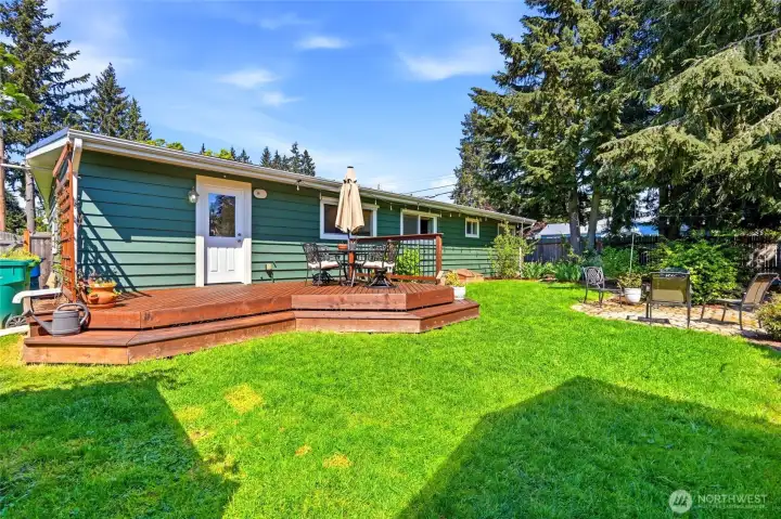 Well maintained exterior with large yard, ideal for gatherings, play, or relaxing outdoors.