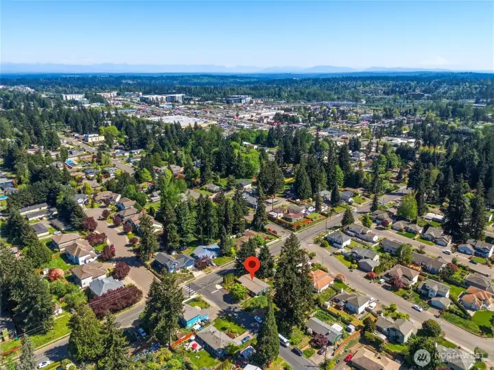Expansive aerial highlighting proximity to shopping, dining, and nearby amenities.