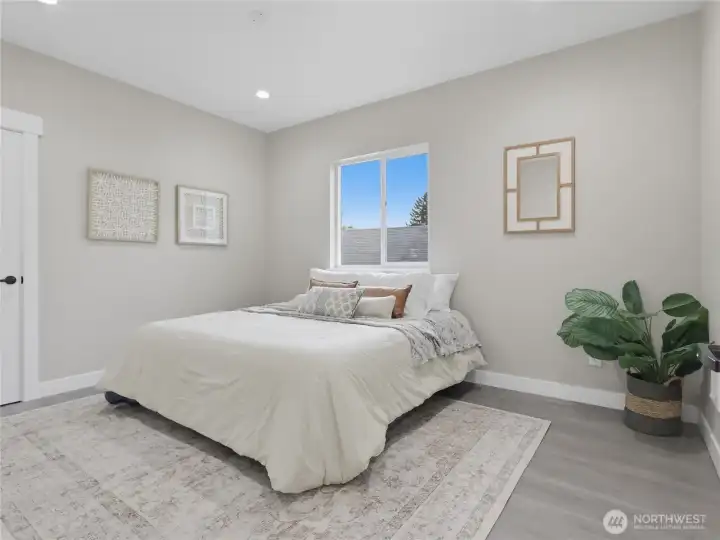 King sized primary bedroom with 2 closets, upstairs
