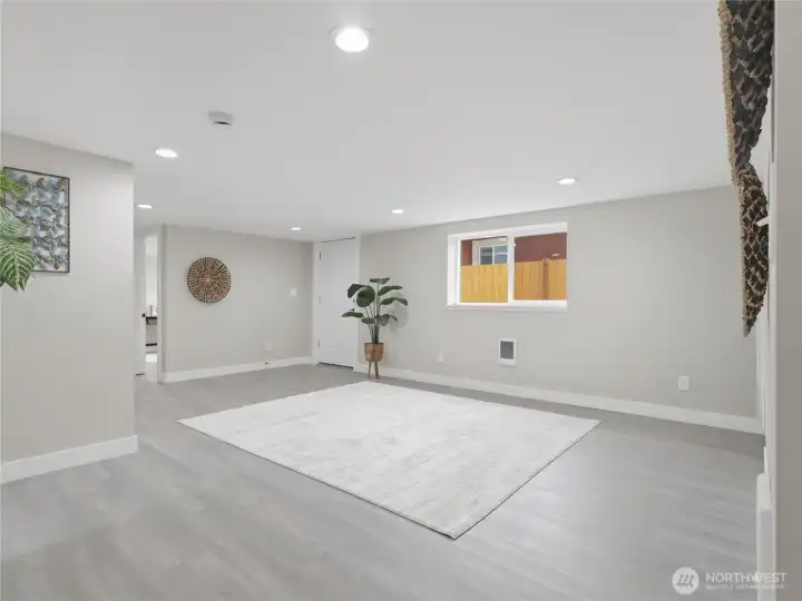 Lower level Living room and ground level exit to front and back yard