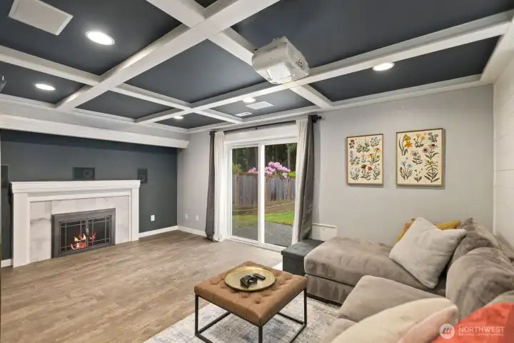 Family Room with hidden projector screen and surround sound