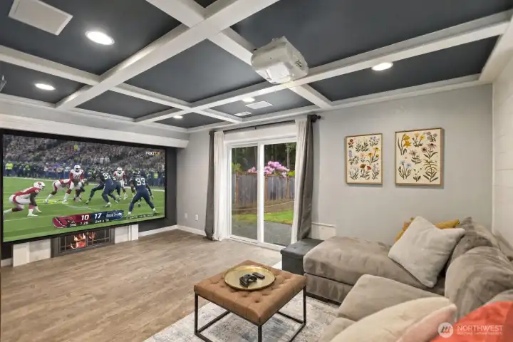 Family Room with hidden projector screen and surround sound. Perfect for Game Days!