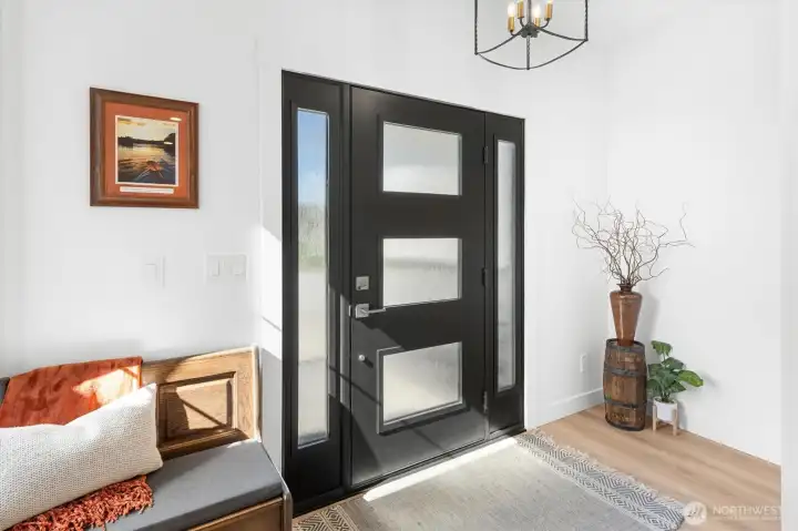 Vaulted Entry way with panels to let all of the light in.