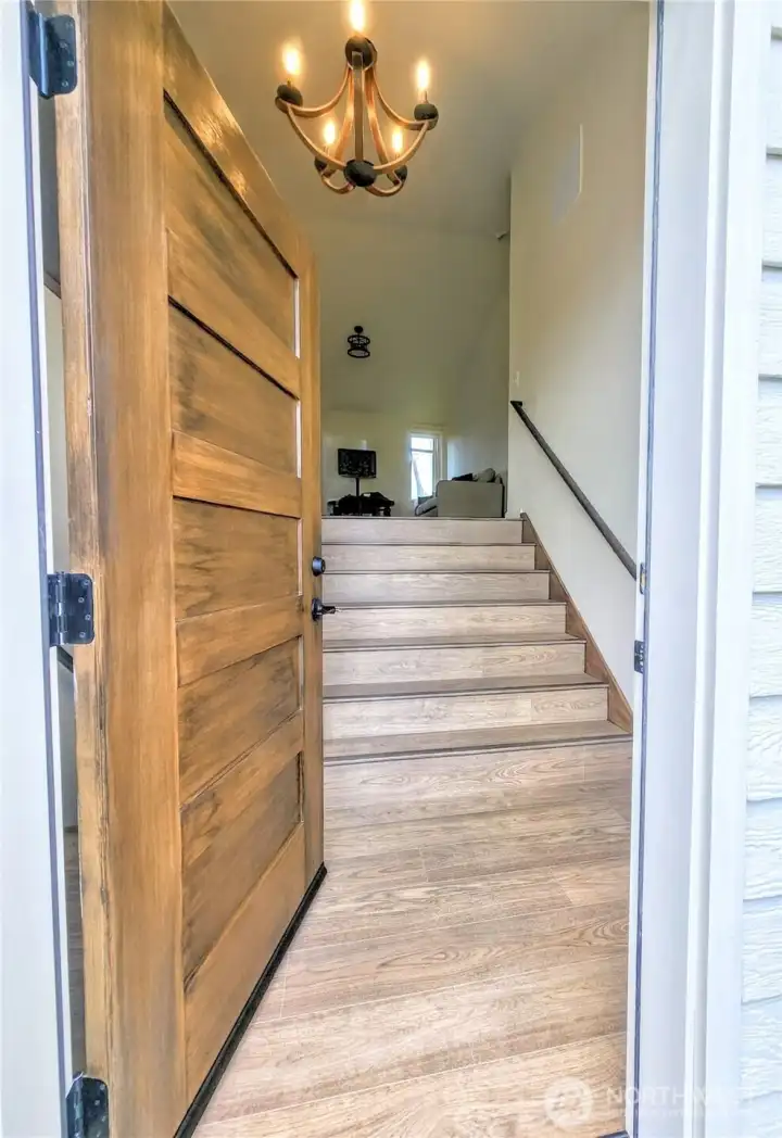 High quality custom front door is actually EZ care stained fiberglass, not wood.