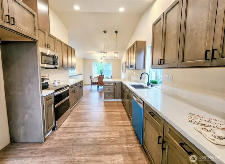 This huge custom kitchen has it all.  Look at all that counter space!