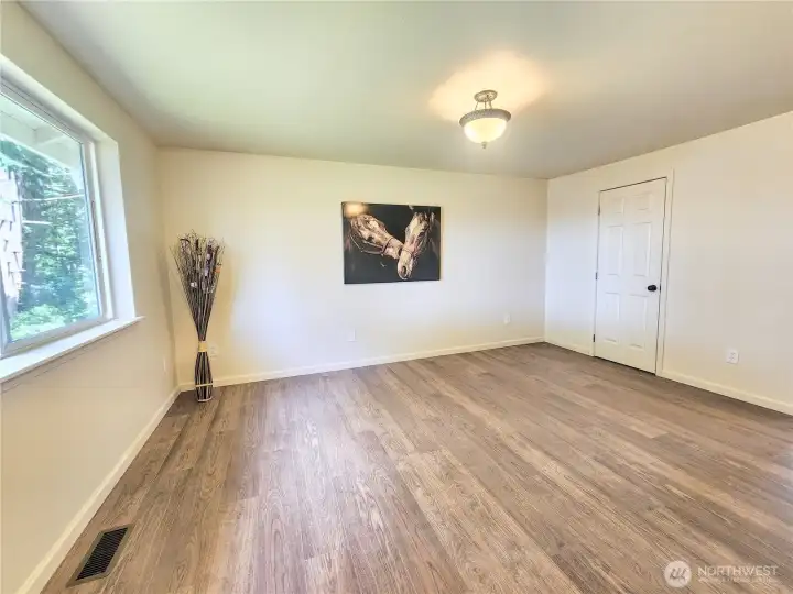 Large primary suite with walk-in closet.