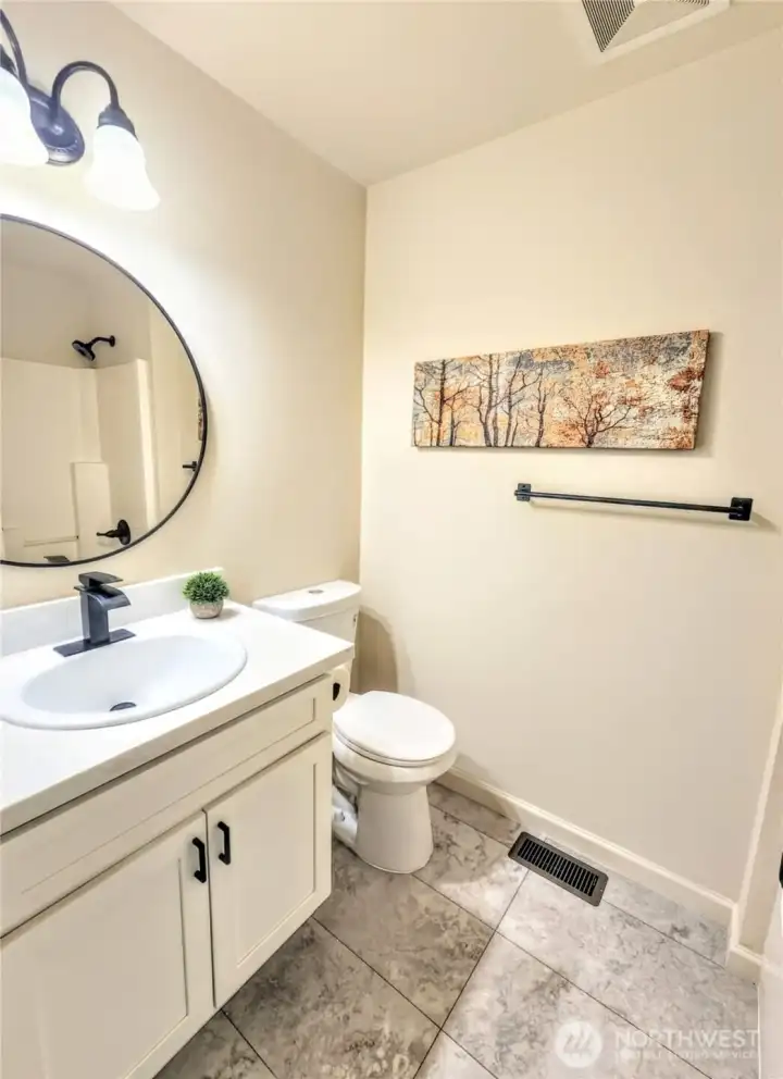Upstairs secondary full bath.