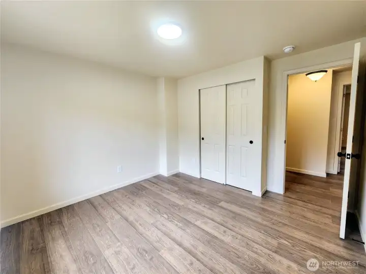 Another secondary upstairs bedroom.