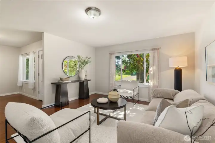 Living room with view of foyer/east entrance