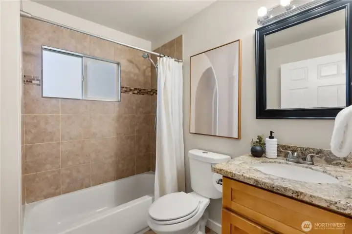 Second full bathroom, right outside the second bedroom
