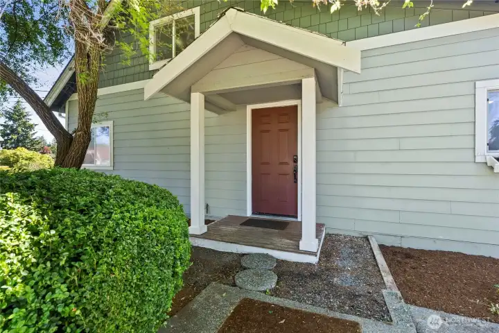 West door, enters into the kitchen area