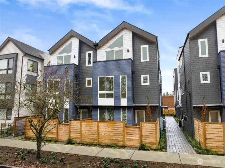 Welcome to the Lotus II Collection — modern homes tucked into charming, tree-lined Mary Ave NW.