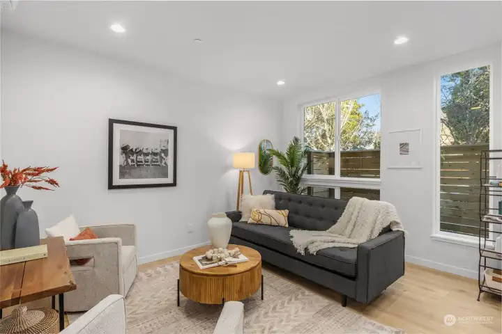 Spacious great room with plenty of layout flexibility—perfect for lounging or entertaining.
