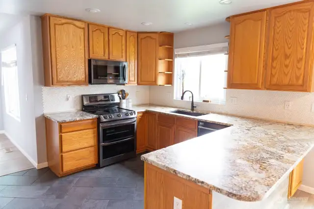 Kitchen with granite counters tops and pantry