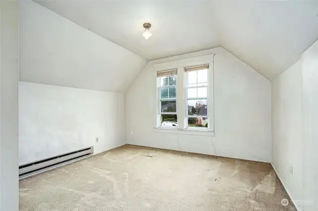 iUpstairs west facing bedroom with peek sound views.