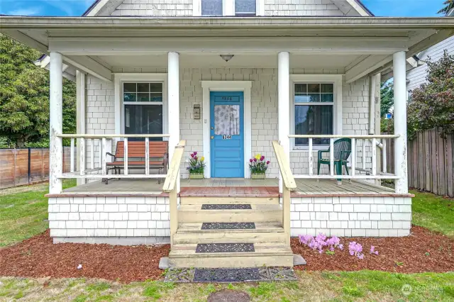 Covered front porch is perfect spot to enjoy the sunsets and sunny western exposures.